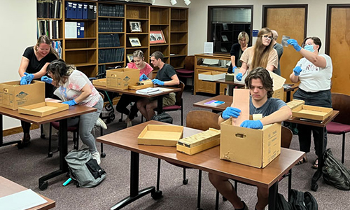 Students sort through archive materials