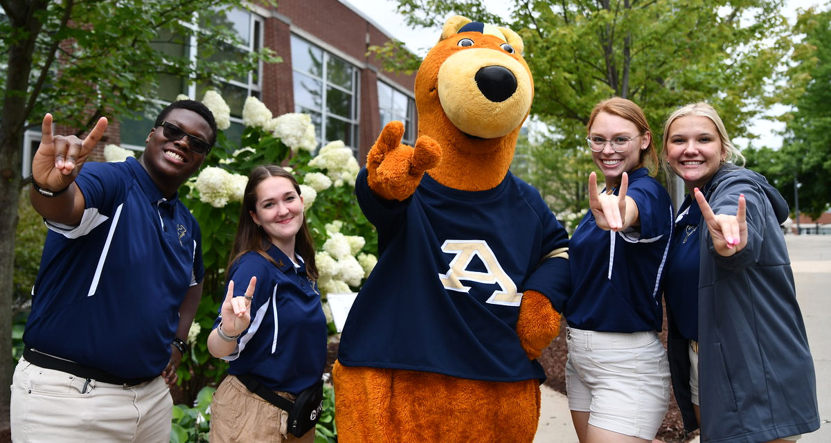 UA students standing with Zippy