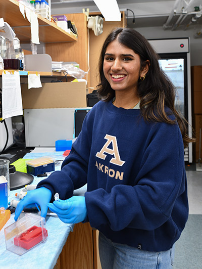 Student Neha Patel in a lab at The University of Akron
